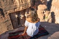A woman enjoy top view of The Treasury Al Khazneh, Petra ancient city, Jordan