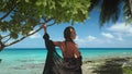 Woman enjoy tropical island beach palm tree view Royalty Free Stock Photo