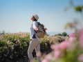 Field of roses in sunny summer day Royalty Free Stock Photo