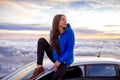 Woman enjoying beautiful cloudscape Royalty Free Stock Photo