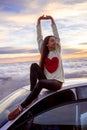 Woman enjoying beautiful cloudscape Royalty Free Stock Photo