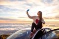 Woman enjoying beautiful cloudscape Royalty Free Stock Photo