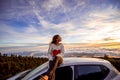 Woman enjoying beautiful cloudscape Royalty Free Stock Photo