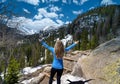 Woman enjoying beautiful scenery on spring hiking trip. Royalty Free Stock Photo