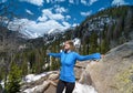 Woman enjoying beautiful spring scenery on hiking trip. Royalty Free Stock Photo