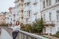 woman enjoying the beauty of building in arnavutkoy