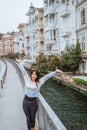 woman enjoying the beauty of building in arnavutkoy