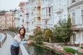 woman enjoying the beauty of building in arnavutkoy