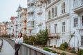 woman enjoying the beauty of building in arnavutkoy