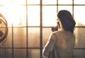 Woman enjoying cup of coffee in loft apartment Royalty Free Stock Photo