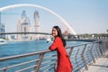 Woman enjoying Dubai view from the water canal