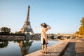 Woman enjoying Eiffel tower in Paris Royalty Free Stock Photo