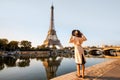 Woman enjoying Eiffel tower in Paris Royalty Free Stock Photo