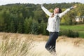 Woman Enjoying Freedom in Autumn Landscape Royalty Free Stock Photo