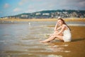 Woman enjoying her vacation by ocean or sea Royalty Free Stock Photo