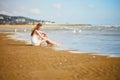 Woman enjoying her vacation by ocean or sea Royalty Free Stock Photo