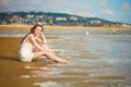 Woman enjoying her vacation by ocean or sea Royalty Free Stock Photo