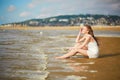 Woman enjoying her vacation by ocean or sea Royalty Free Stock Photo