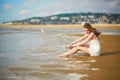 Woman enjoying her vacation by ocean or sea Royalty Free Stock Photo