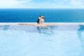 Woman enjoying infinity pool 1 Royalty Free Stock Photo