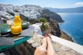 Woman enjoying morning in beautiful Santorini