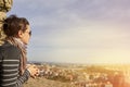 Woman enjoying Porto panoramic view from Clerigos Tower, Porto