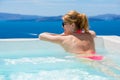 Woman enjoying relaxation in pool Royalty Free Stock Photo