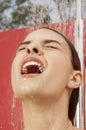 Woman Enjoying Shower At Resort Royalty Free Stock Photo