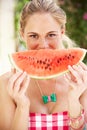 Woman Enjoying Slice Of Water Melon Royalty Free Stock Photo