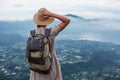 Woman enjoying sunrise from a top of mountain Batur, Bali, Indonesia Royalty Free Stock Photo