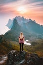 Woman enjoying sunset view hiking alone on mountain top outdoor travel summer vacations healthy lifestyle Royalty Free Stock Photo
