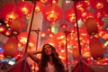 Woman enjoying traditional red lanterns decorated for Chinese new year Chunjie Royalty Free Stock Photo