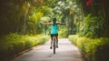 A Woman Enjoying the Tropical Park Trail on a Summer Cycling Adventure. Generative AI