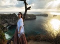 Woman enjoying view of Diamond Bay, Nusa Penida island, Indonesia