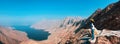 Woman enjoying view of Fjord Khor Najd in Musandam Oman Royalty Free Stock Photo