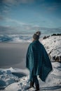 Woman enjoying view in mid Norway. Nice lifestyle instagram-like photo of young model in winter