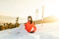 Woman enjoying the view from mountain slopes, relaxing