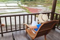 Woman enjoying view of rice fields Royalty Free Stock Photo