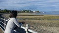 Woman enjoying the views of dunoon beach