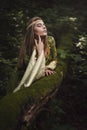 Woman enjoys forest beauty Royalty Free Stock Photo