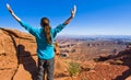 Woman Enjoys Scenic Overlook from Canyonlands' Island in the Sky