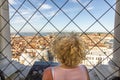 Woman enjoys scenic view to roof of san marco cathedral and skyline of Venice