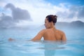 Woman enjoys spa in geothermal hot spring Royalty Free Stock Photo