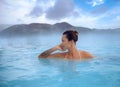 Woman enjoys spa in geothermal hot spring Royalty Free Stock Photo