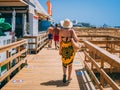 Woman entering at NoSoloÃÂgua, a restaurant at Vilamoura beach, Royalty Free Stock Photo