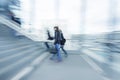 Woman entering stairs, blue toned image