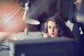 Woman entrepreneur busy with her work in office. Royalty Free Stock Photo