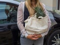 Woman with environmentally friendly fabric bag