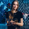 Woman in evening dress with glass of sparkling wine Celebration new year, christmas Royalty Free Stock Photo