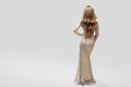 Woman Evening Sparkling Dress Back Rear View, Elegant Fashion Model in beautiful Gown, Beauty Studio Portrait